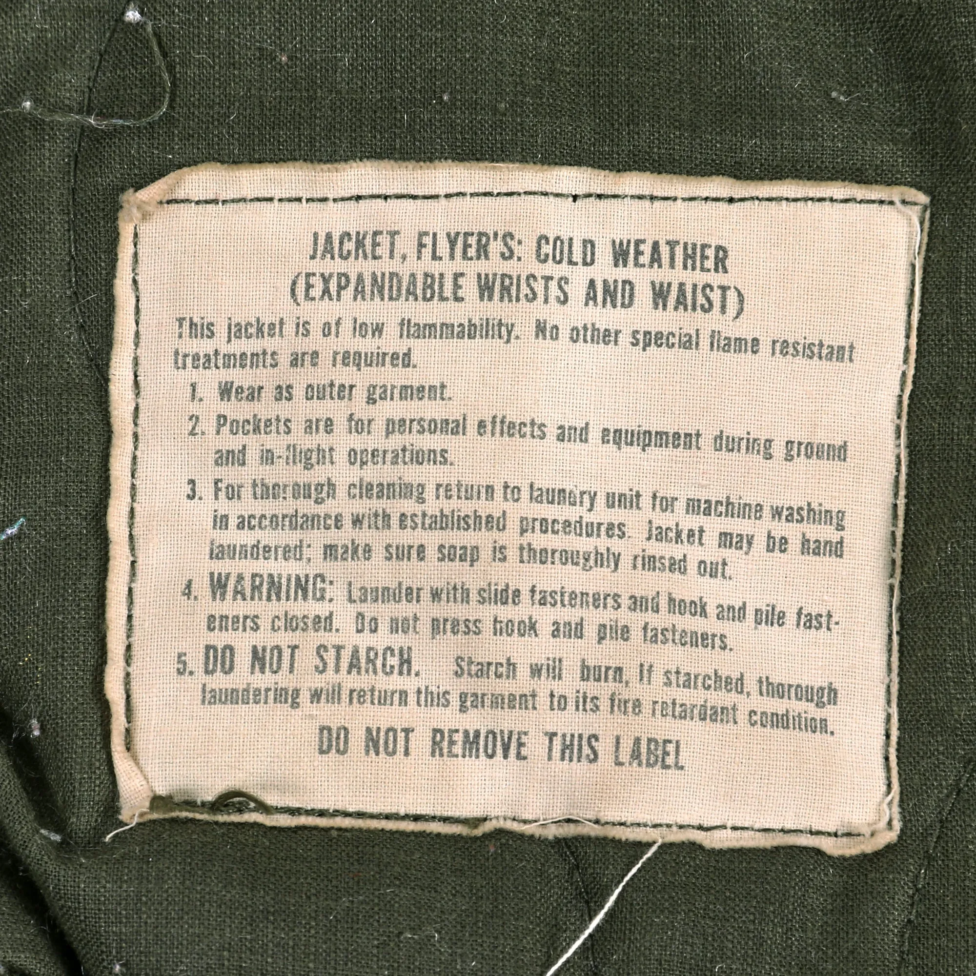 Original U.S. Vietnam War Cold Weather Flight Jacket, Flying Suit and APH-5 Helicopter Pilot Grouping - (3) Items